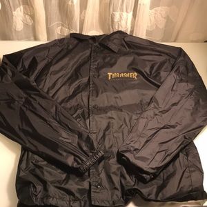 Trasher pentagram windbreaker in black and gold